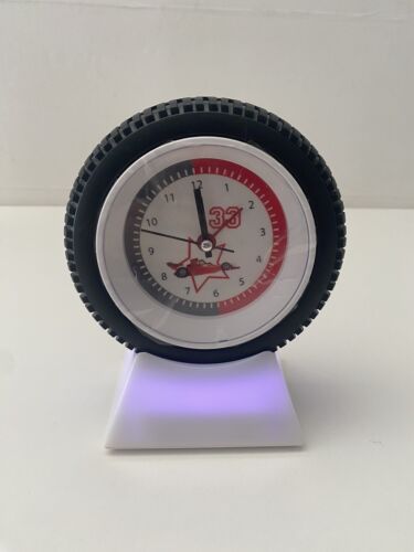 Racing Car Tyre Alarm Clock With Multicoloured Light Up Stand Novelty New Boxed - Picture 1 of 22