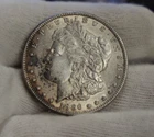 1886 US Morgan Silver Dollar $1 AU (Cleaned)