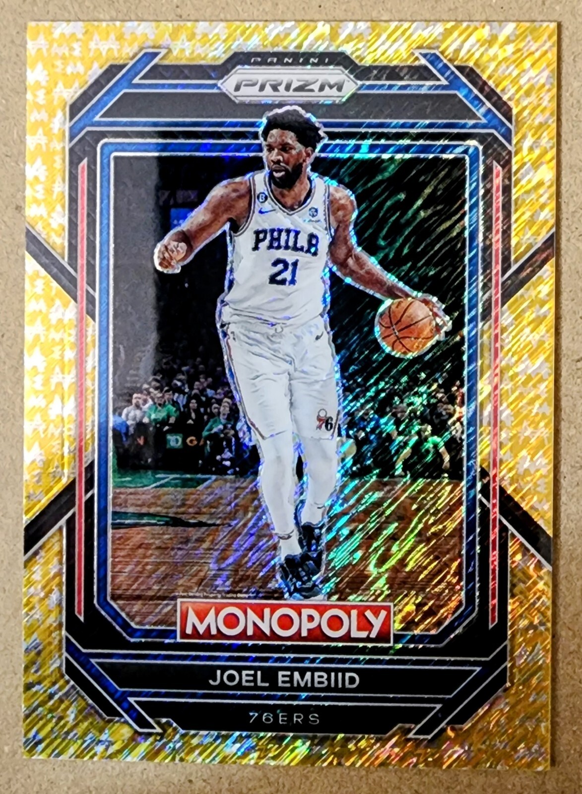 2022-23 Panini Prizm Monopoly Joel Embiid #67 Gold Money Shimmer 267/500 76ers