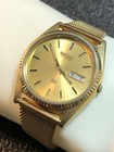 Vintage Seiko SQ Mens Dress Watch Gold Tone 5Y23 Day/Date Sunburst Dial New Bat