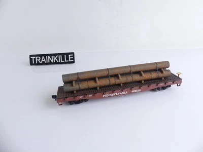 EVEMODEL HO WAGON PLAT A BOGIES TYPE US + CHARGEMENT DE 3 TUYAUX - Photo 1/2