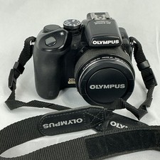 Olympus SP-570UZ 10.0MP Digital Bridge Camera 20x Optical Zoom With Memory Card