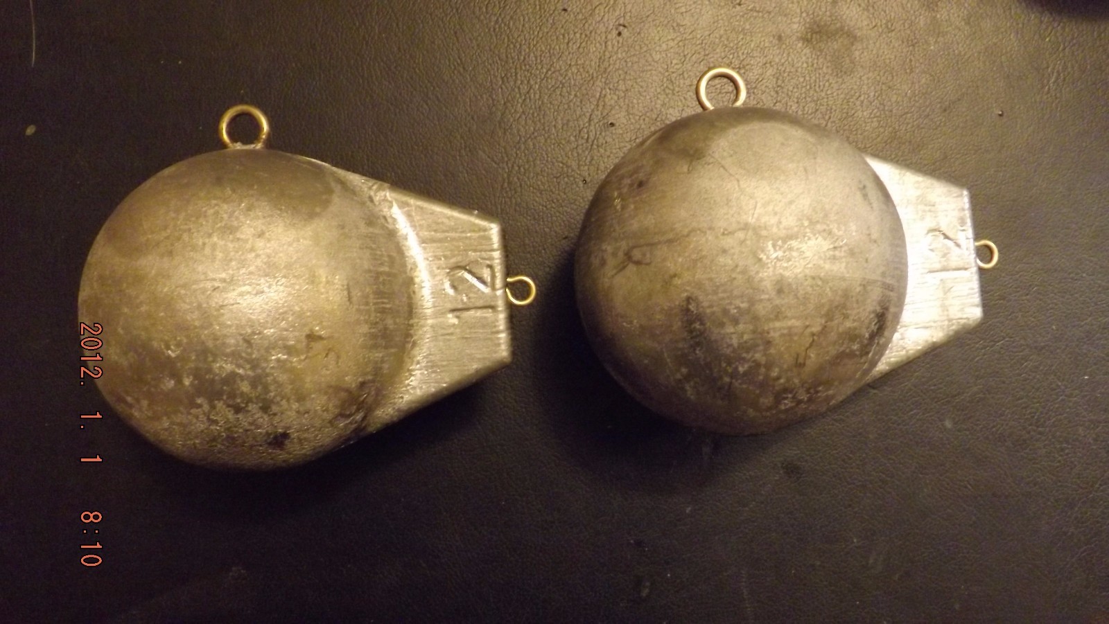 Dos bolas de plomo 12 lb (approx. 5.44 kg) Pesca profundizador Cannon Con Ojales De Latón Dos bolas de plomo 12 lb (approx. 5.44 kg) Pesca profundizador Cannon Con Ojales De Latón