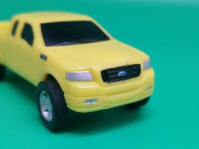 Ertl Ford F-150 FX4 Pickup Truck Off-Road Cab YELLOW 1:64