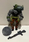 Vintage 1988 TMNT Rocksteady Action Figure - w/ Rifle and Manhole Cover Shield