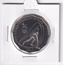 AUSTRALIAN: 2006 50 CENT XVIII COMMONWEALTH GAMES HOCKEY UNC COIN #6884