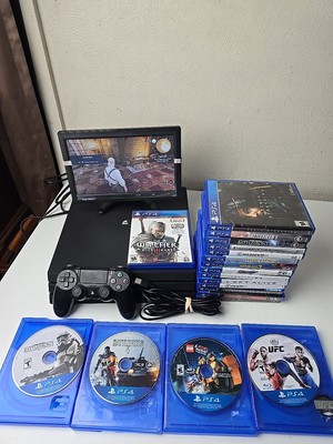 Sony PS4 PlayStation 4 Pro 1TB Console Bundle, 1 Controller, and 19 Games USED