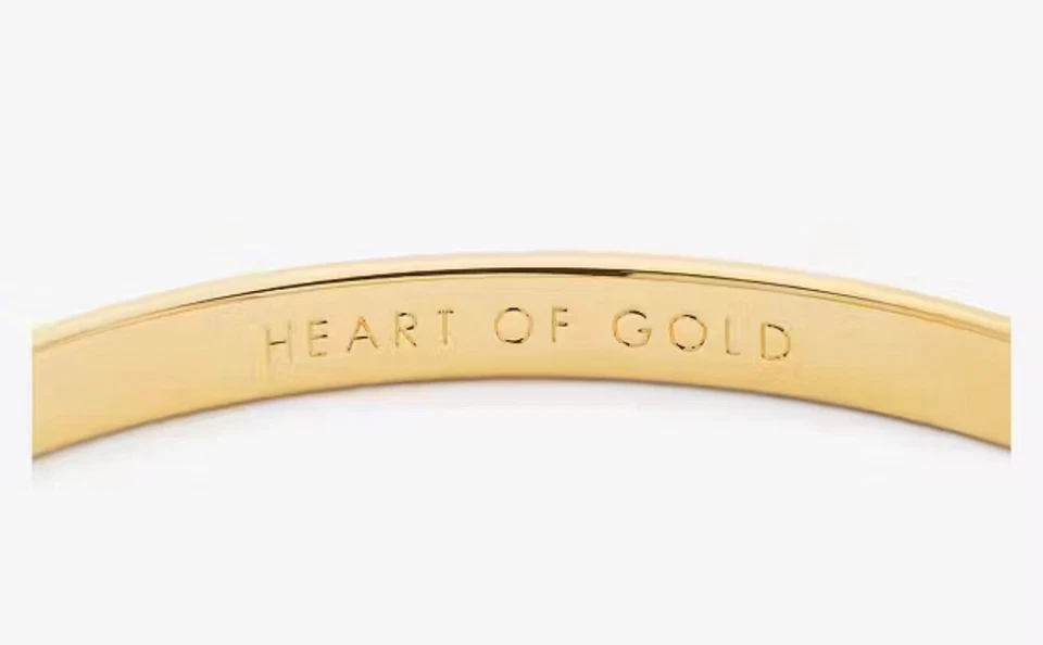 Brazalete Brazalete Kate Spade "Corazón de Oro", 5mm, Tono Dorado Foto 2 de 3