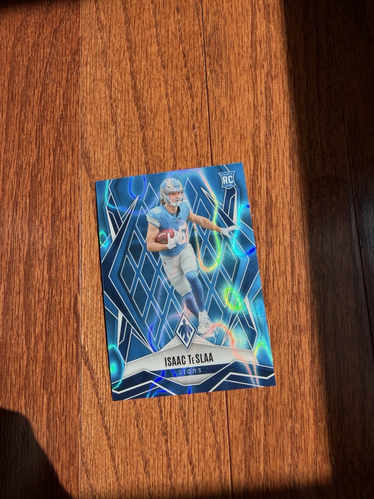 2025 Panini Phoenix - Rookies Isaac Teslaa #189 Light Blue Lava /325 (RC)