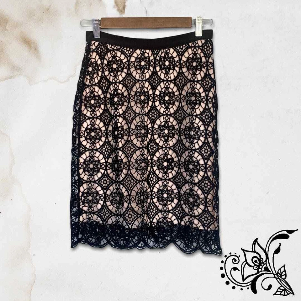 Falda de encaje Christian Dior de lana y seda de longitud media negra para mujer EE. UU. 4 FR 36