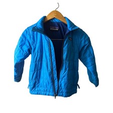 Patagonia Kids' Nano Puff Brick Quilt Jacket in a vibrant blue color.