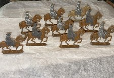 14 VINTAGE LEAD SOLDIERS ON HORSES 1 EXTRA DUDE Some partially painted.