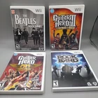 Lot of 4 Wii Rock Band Beatles Guitar Hero Aerosmith III Legends Of Rock CIB