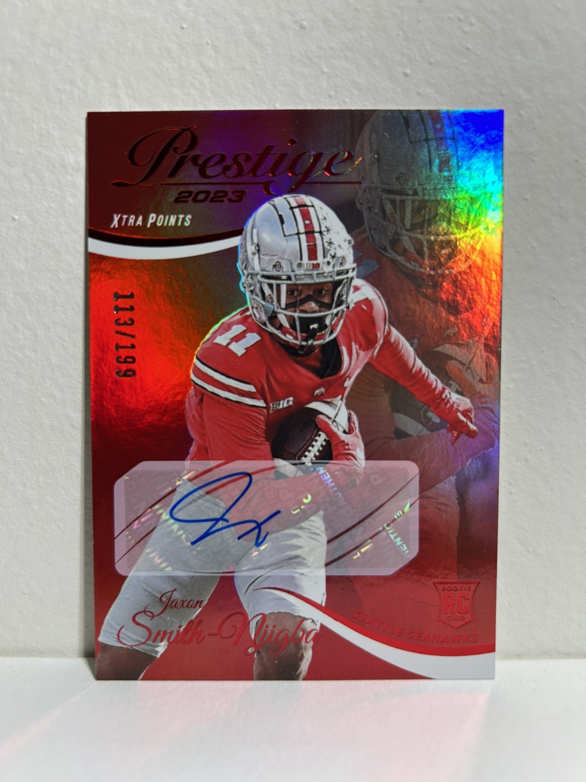 2023 Prestige Jaxon Smith-Njigba #’d /199 Xtra Points Red Rookie Auto Seahawks