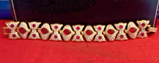 Gold Tone Red Rhinestone and Clear Rhinestone Bracelet