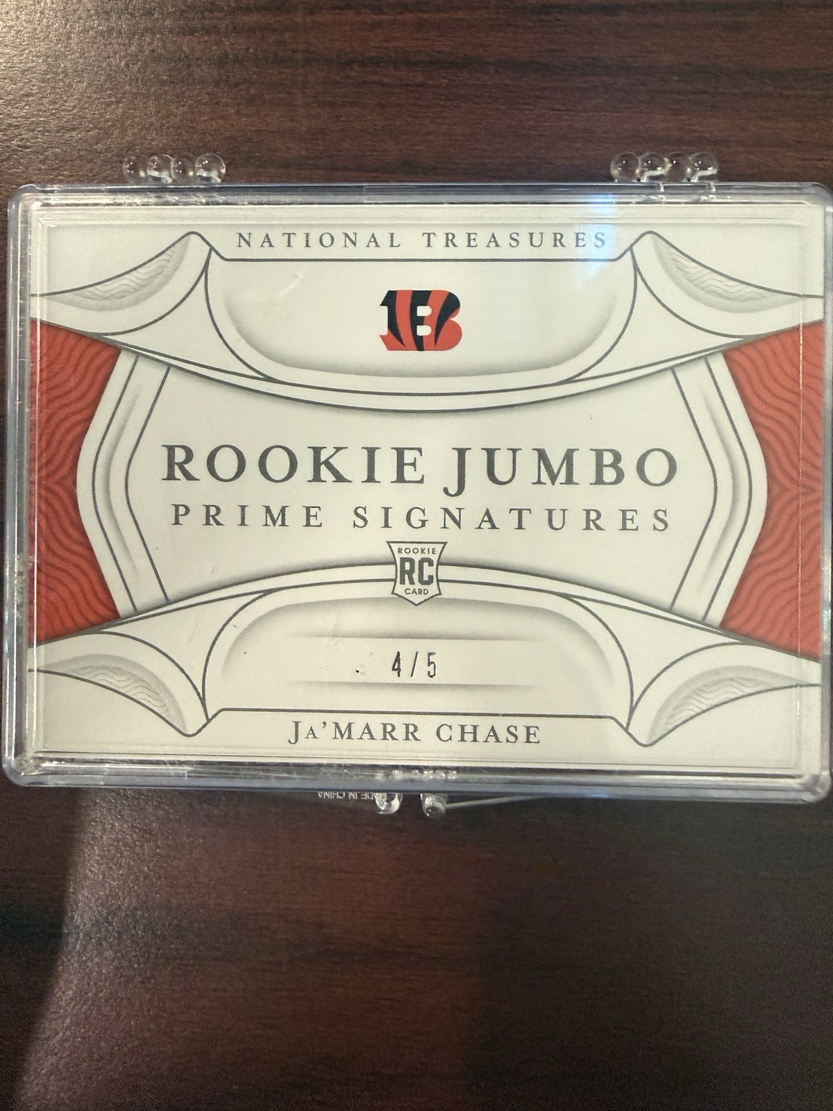 Panini 2021 National Treasures Ja'Marr Chase Rookie Auto Laundry Tag Booklet 4/5 view 2