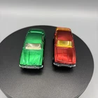 2 x Corgi Rockets Jaguar XJ6 vintage diecast metallic green & Red Jenson