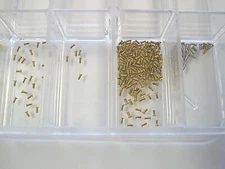 Choose any 4 new Piaget gold case back screws .70 mm / .90 mm. Other sizes too