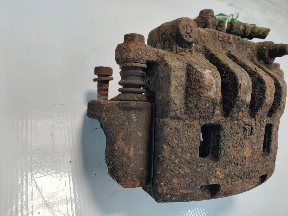 PINZA DELANTERA DERECHA SUBARU OUTBACK MK3 3.0 TOKICO 55618 Foto 2 de 4