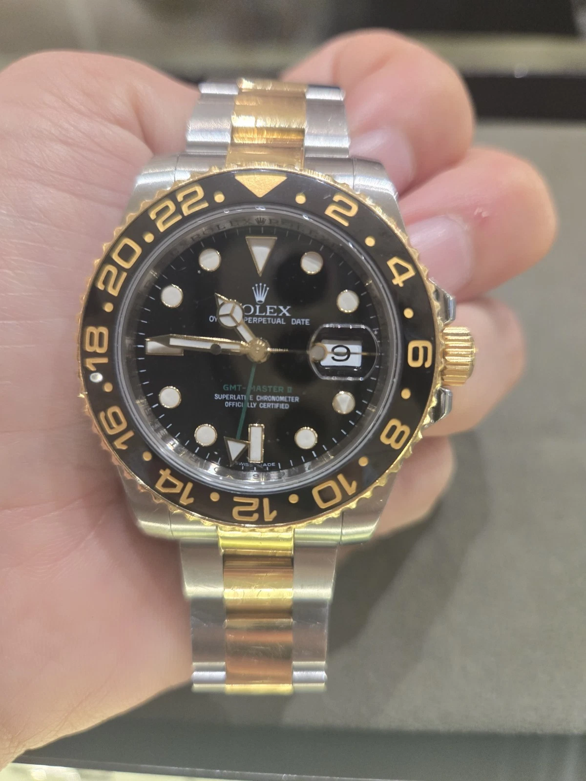 Rolex GMT-Master II 116713LN Silver and Gold Oyster Bracelet with Black Bezel