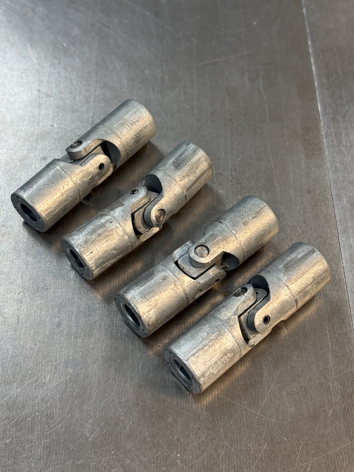 QTY 1 GUARDIAN CAST ALUMINUM UNIVERSAL JOINT 3/8" BORE ON BOTH ENDS NEVER USED