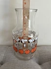 Vintage Peanuts Snoopy Orange Juice Carafe Glass Pitcher by Charles Schulz W/Lid
