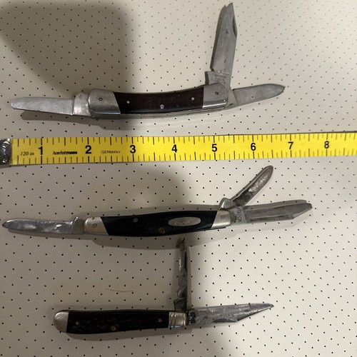 Three used pocket knives eBay