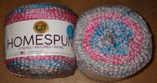 2 skeins of Lion Brand Homespun Stripes. 6 oz, 185 yds, Bulky, Nursery