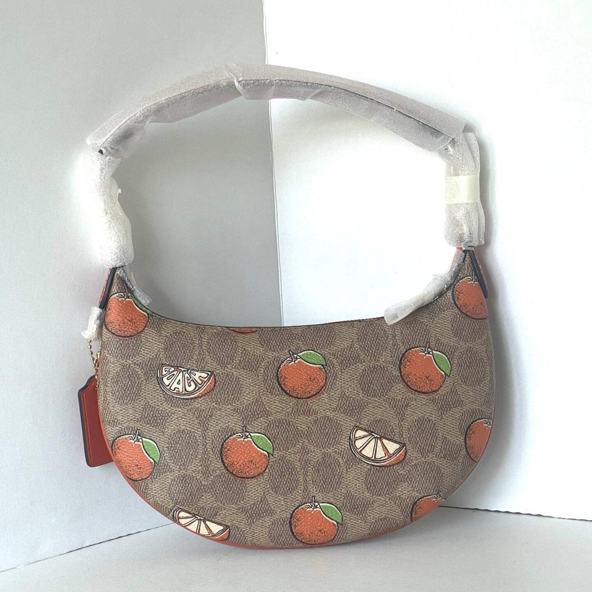 新品未使用 COACH ミニバッグ PEYTON Coach Mini Payton Shoulder Bag Oranges Signature Canvas