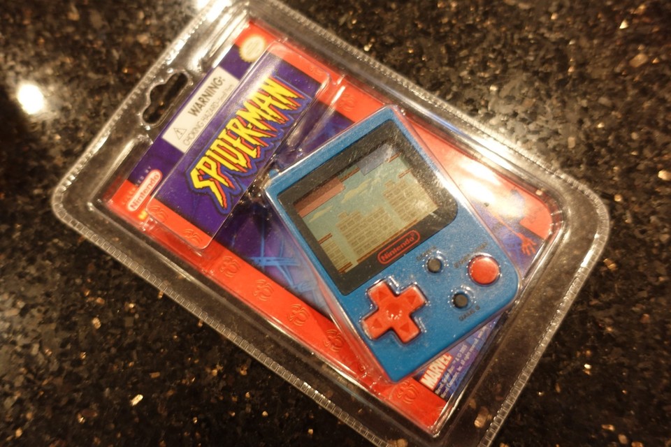 Actual vintage Spider-Man LCD tabletop game from the Tiger/Coleco era — a physical piece of superhero gaming history that looks wild on a shelf.