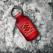 Handmade leather keychain with SUZUKI logo in RED. 1EA