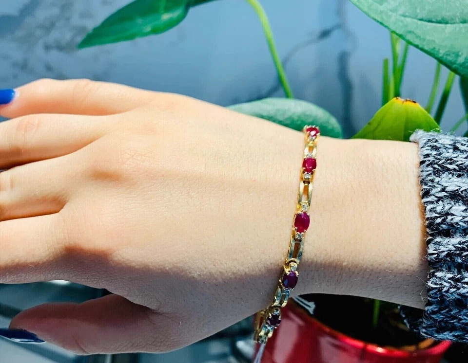 Brazalete de tenis para mujer enchapado en oro amarillo de 14 quilates creado en laboratorio rubí rojo corte ovalado 4 quilates Foto 3 de 3