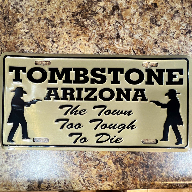 Tombstone Arizona Souvenir License Plate "The Town Too Tough To Die"