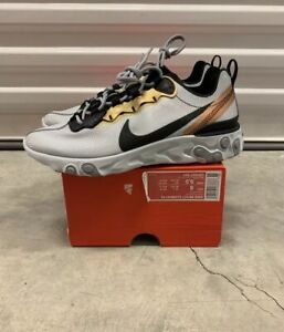 nike react element black and gold