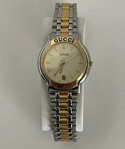 Montre suisse femme Gucci 29 mm bicolore inox 8000 L vintage classique 6"