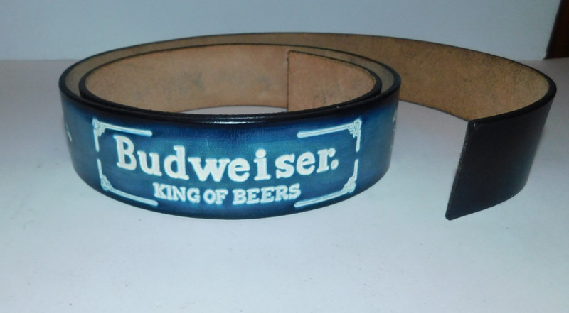 NEAT UNFINISHED 51" LONG LEATHER BELT WITH BUDWEISER BEER IN BLUE
