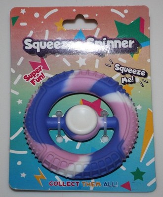 MMG Brands Squeeze Spinner 2-in-1 Fidget Stress Relief Toy 12+ Blue Pink White