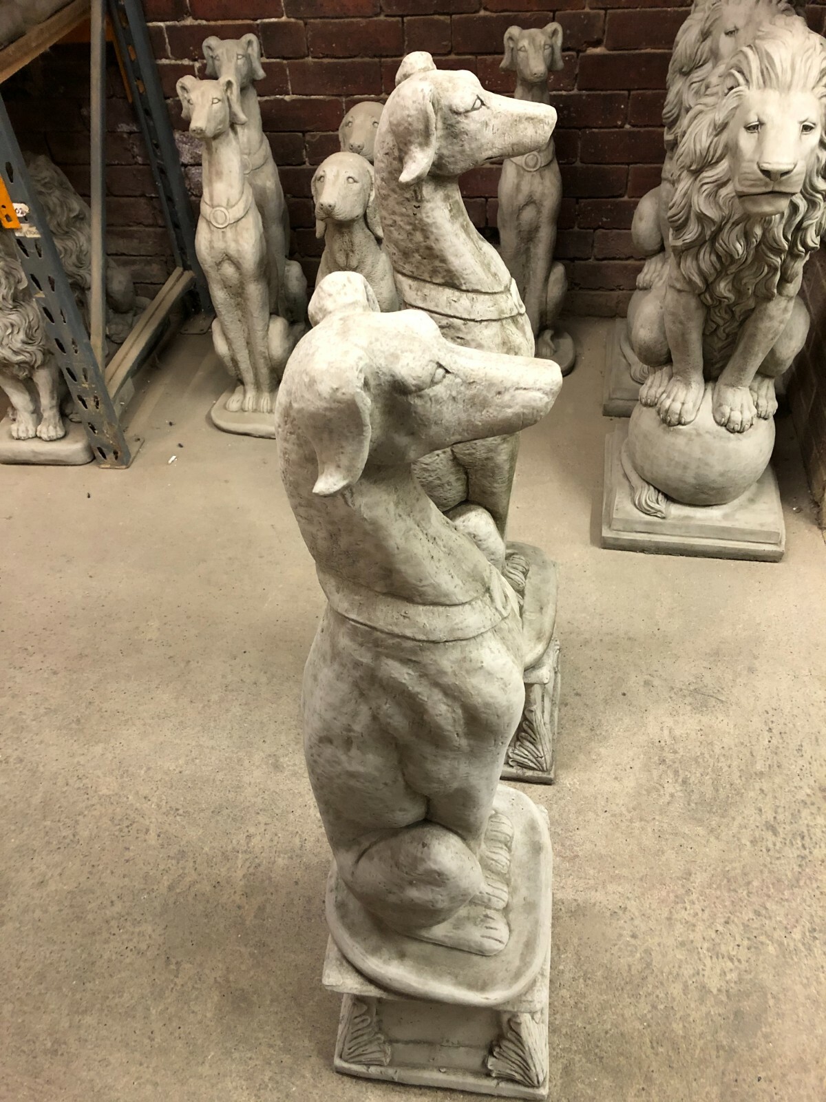 Greyhounds Salukis whippets on pedestals concrete garden statue