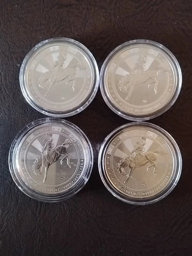 4-1oz. Scottsdale Mint "Ride for the brand" silver rounds, Buffalo privy.