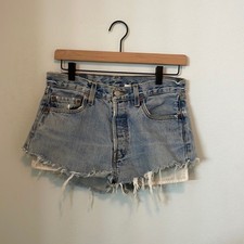 VINTAGE distressed Levi 501 s cut off shorts