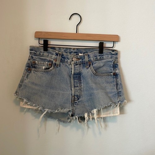 VINTAGE distressed Levi 501’s cut off shorts