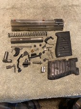 Used Jimenez Ja Nine Parts Silver Slide Grips Trigger Firing Pin Springs 26984 Used Jimenez Ja Nine Parts Silver Slide Grips Trigger Firing Pin Springs 26984