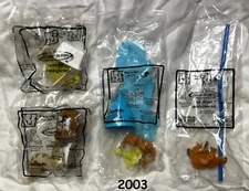 ICE AGE toys (complete set of 4)  ICE AGE Fox Carl's Jr. / Hardees (2003)  NIOP
