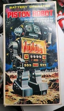 Vintage 1960's-1970's PISTON ROBOT Battery Operated