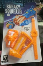 1989 Global Sneaky Squirter Water Blaster Wrist Squirter NEW Vintage Toy Orange