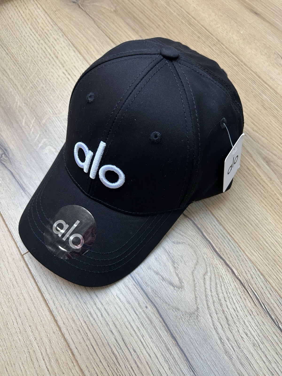 ALO Cap One Size Fits All Adjustable Strap Black And White Colour Way