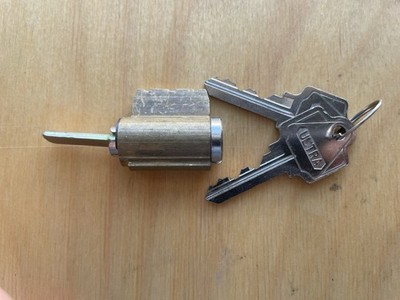 Ultra KIK Cylinder. Arrow AR1 Keyway. Brushed Silver Finish. Bottom Lug Type. 