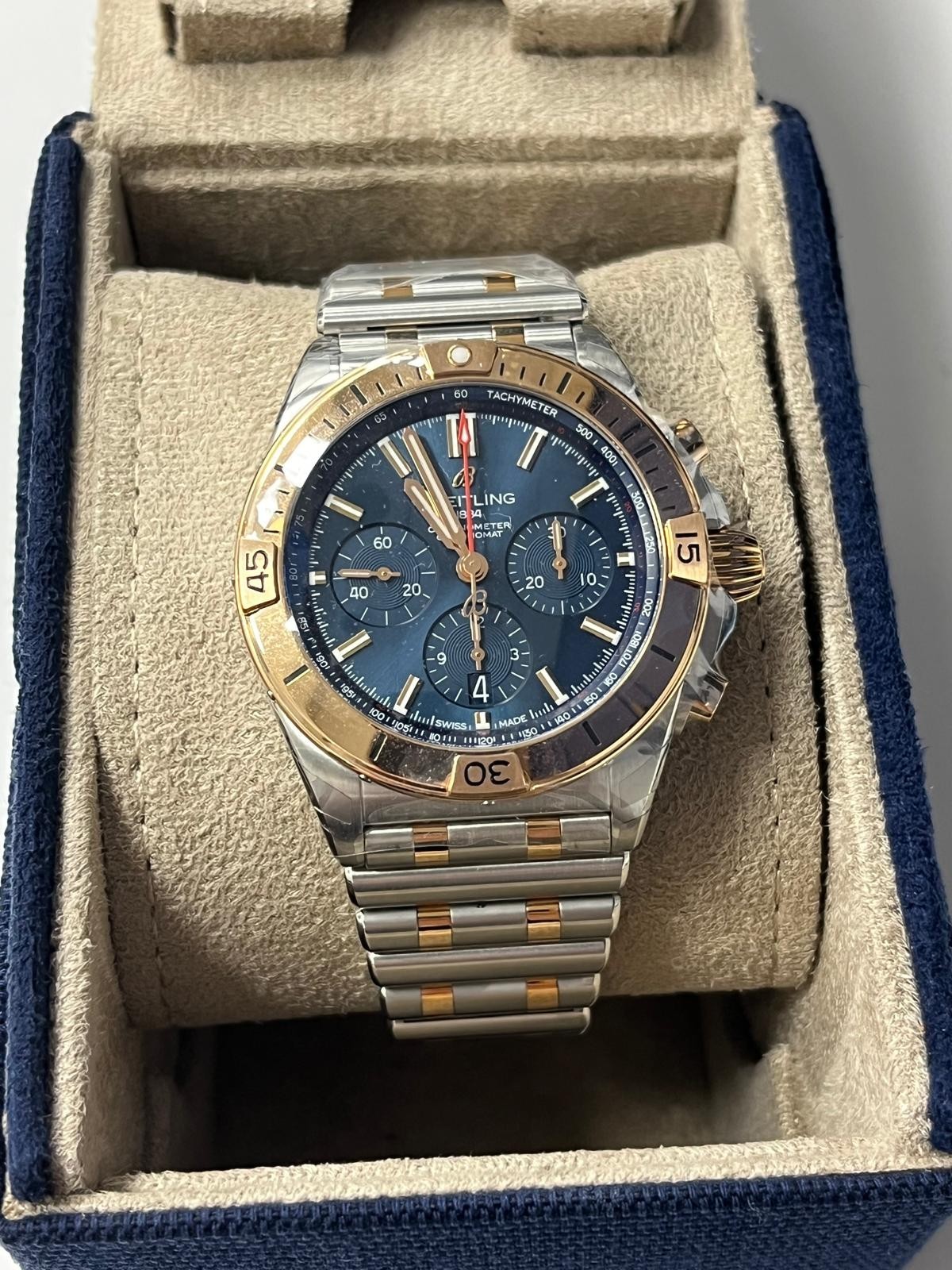 Breitling Chronomat B01 42mm Gold Bezel Blue Dial Watch UB0134101C1U1