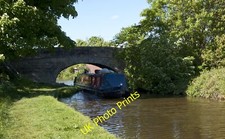 Photo 12x8 A narrow boat passing under bridge 54 on the Lancaster Canal Bo c2015