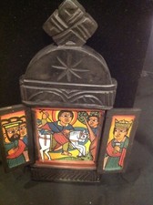 Ethiopian wooden icon. Saint George killing the dragon, painting on wood.